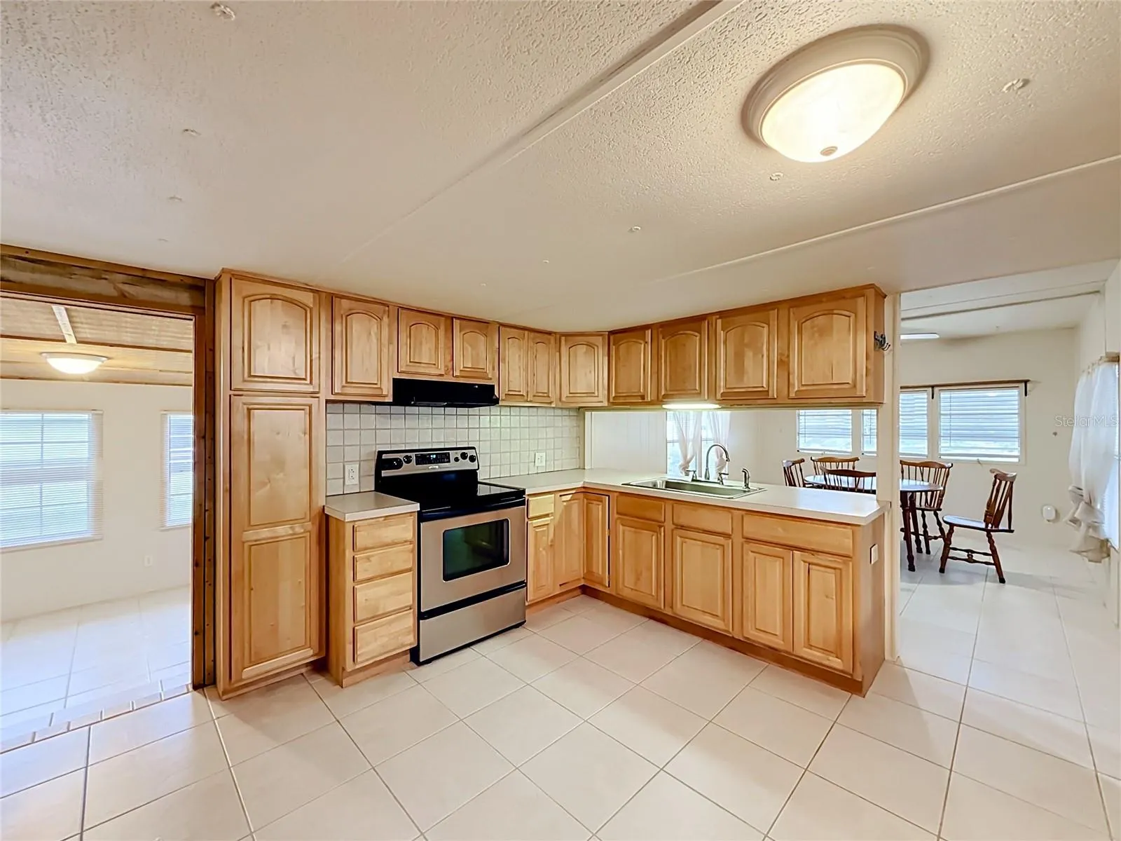 Kitchen open to LR and Dining