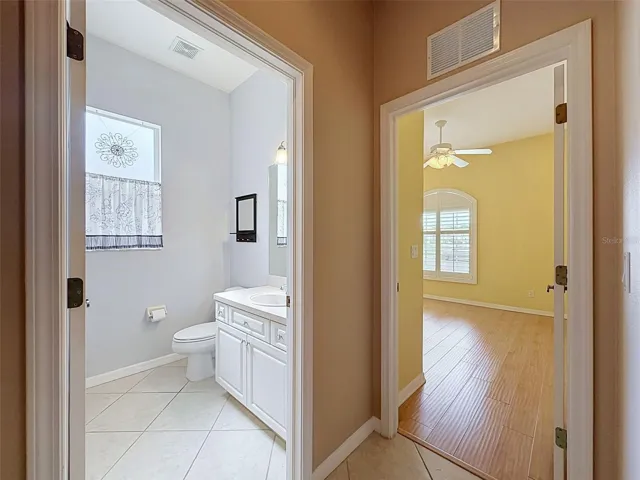Bathroom 2 with view of hall and Bedroom 3