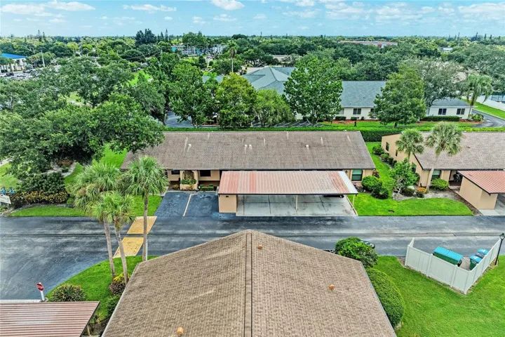 Front of condo and carport