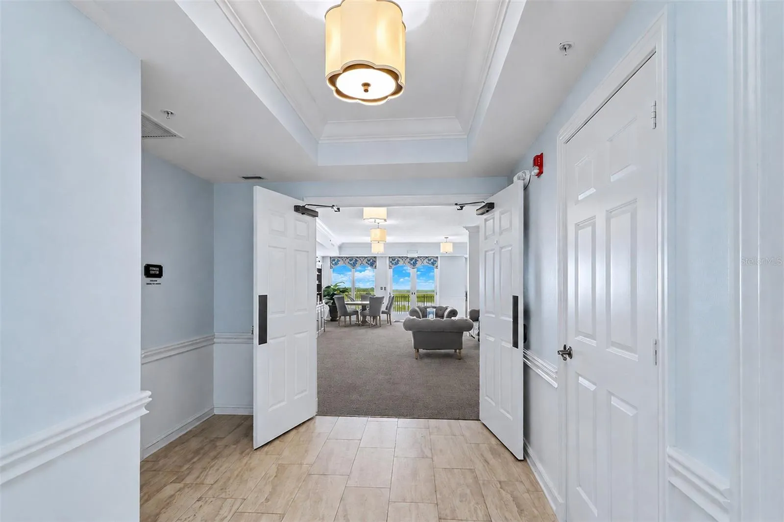 ...Sereno Amenities: Waterfront Clubhouse w Wifi Straight Ahead.. Workout Facility Door on Left... Two Restrooms on Right.. 2nd Floor has Balcony Lounging  or Stairs to Pool Area.