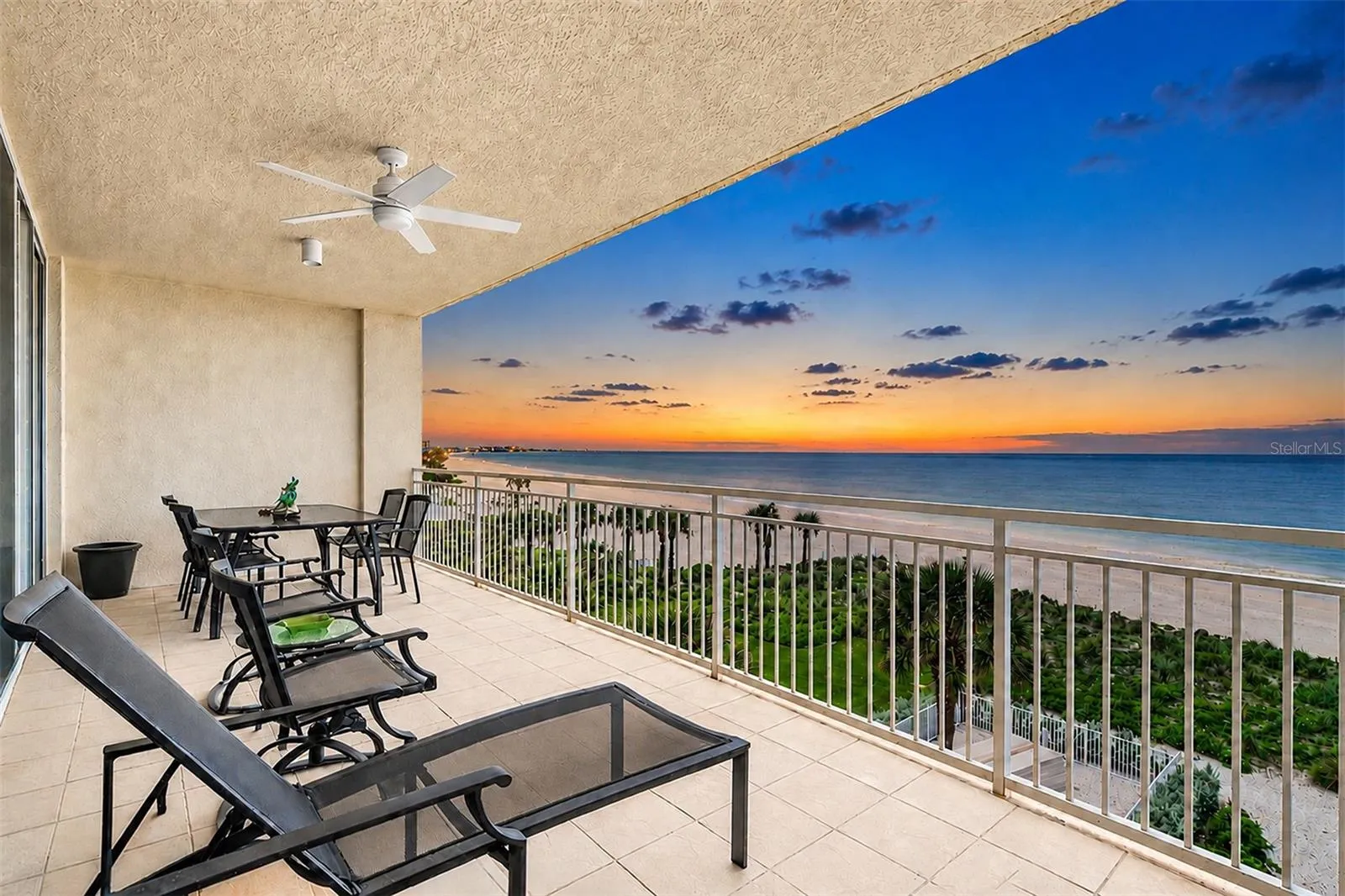 ... Sunsets and Twilights Shots of the Sereno. The Architectural Arc of the Complex Affords the Units  with Long Range Gulf Water Views. Residence 404 is Sitting  Right in the Center in the Cat's Seat.