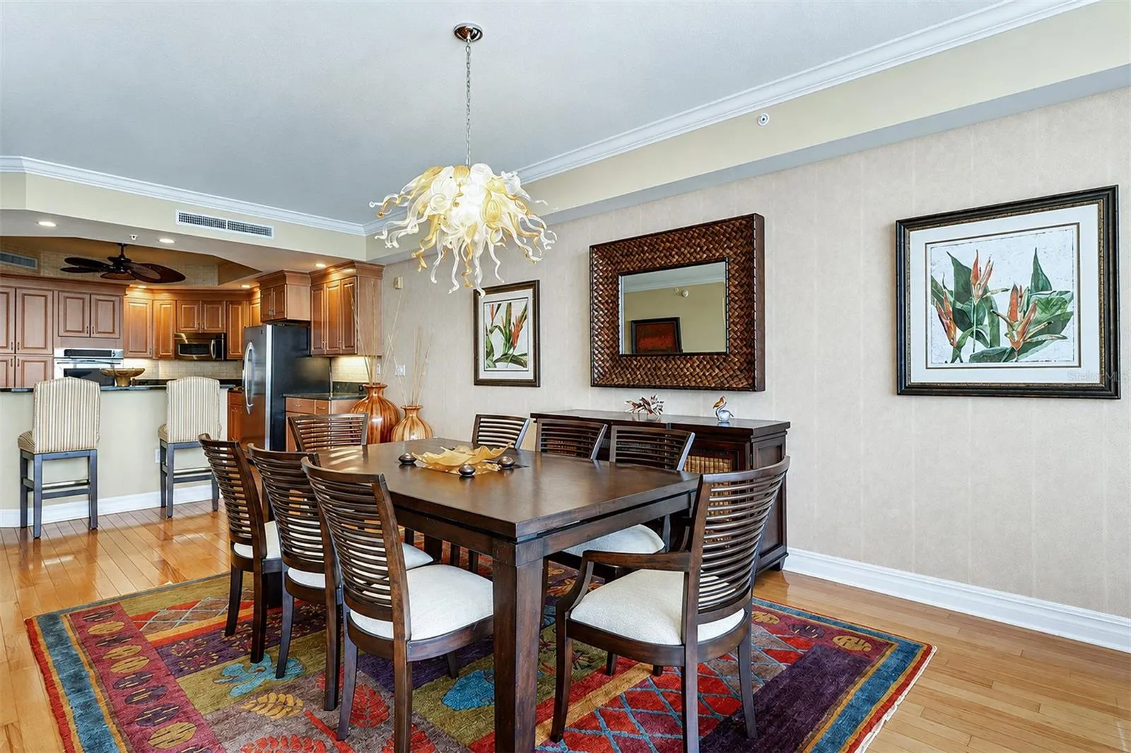 ... Dining Area off Kitchen..Owner had Wood Floors Installed thru-out the entire Unit . Exceptions are Tile in the Bathrooms and Laundry Room.