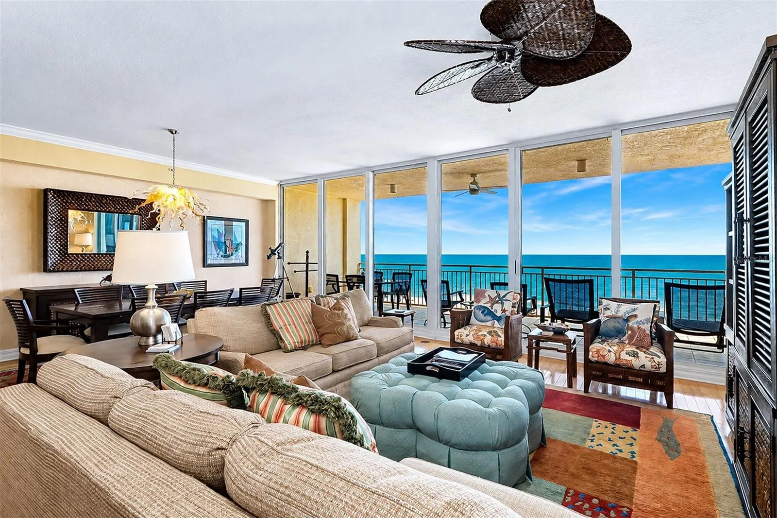 ... Floor to Ceiling High Impact Sliders  Front the Great Room Area Including thr Kitchen.. Balcony runs 27 Foot Long x 10 Foot Wide.. Perfect Spot for Brunch or an Early Dinner or Just Relaxing and Enjoying Life..
