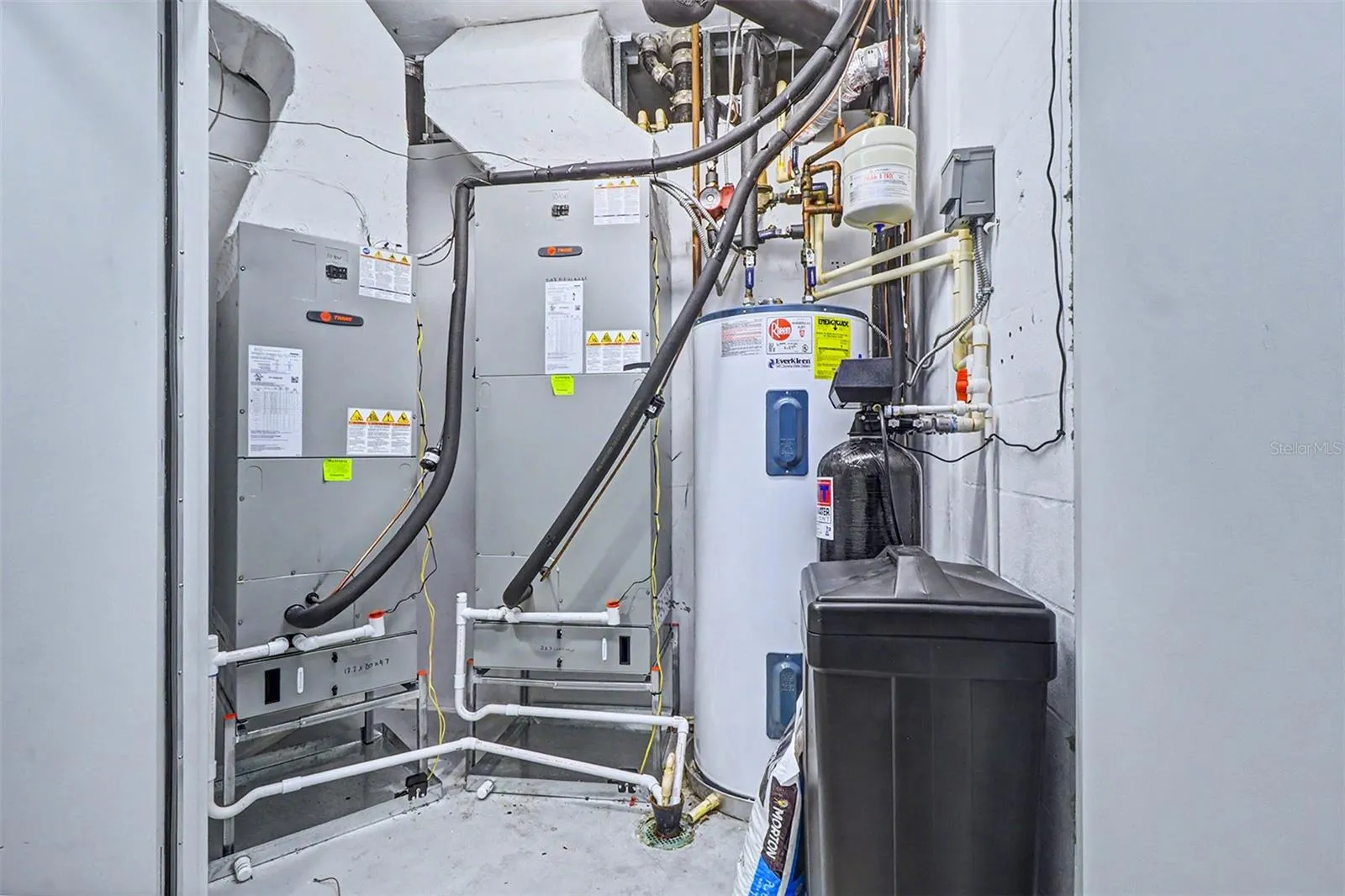 ...Taylor Woodrow - Upscale Product - Example.. Residence 404 has Mechanical Room in Hallway Right Outside  Unit Door.  This  Allows Noise Reduction from A/C Units..  PLus  AC and  Water Heater Techs Can Service Your Condo Without going inside the Condo.. Note: Water Softener &amp; Hot Water Circulating  Device . When in Use - You have Hot Water Instantly in Every Location Without Waiitng.