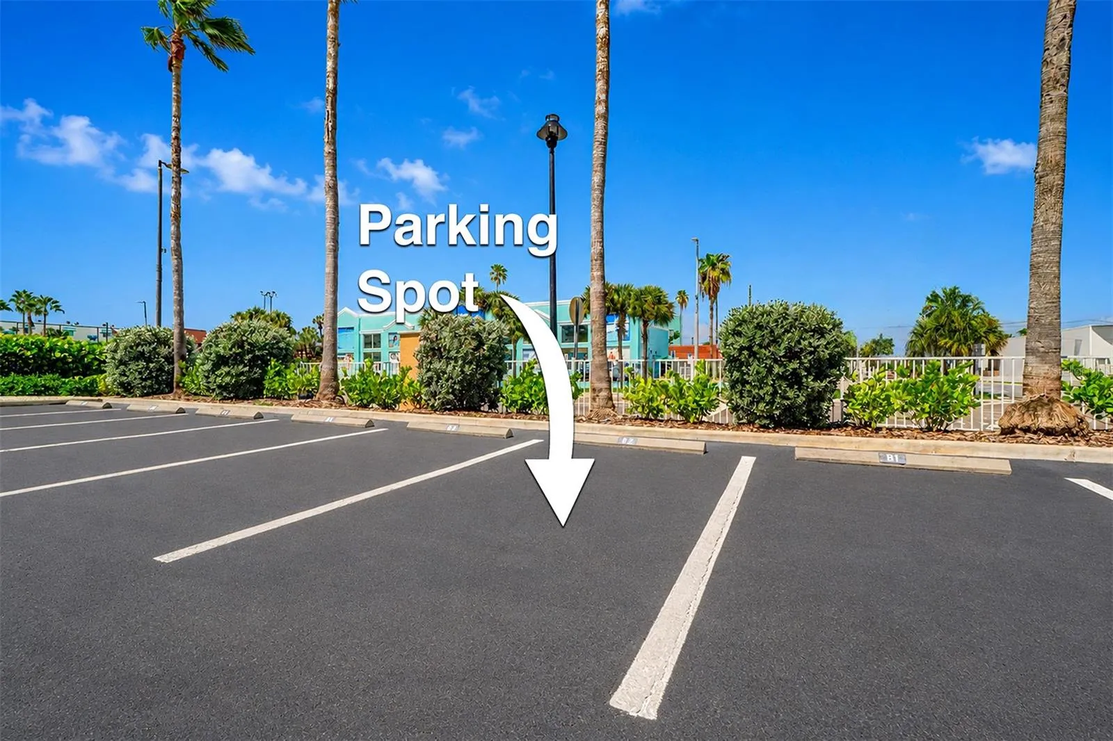 .... Sereno Residnece 404 Conveys with Garage Spot # 24 and Exterior Spot # 82.. There are also extra Visitor Parking Spots outside for Your Guests. Photo of Outside Spot # 82 on North End of Ext.