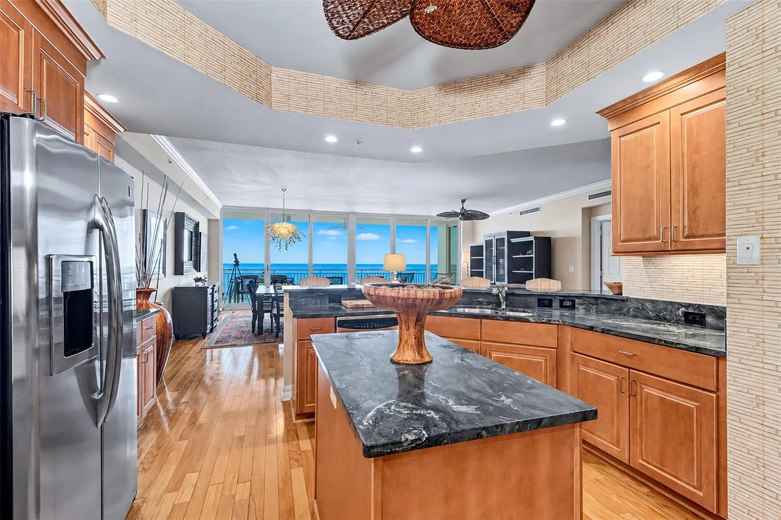 ...... Kitchen Pic 3.. Solid Wood Cabinetry - Granite - GE Profile Appliance Package . Prep Island.. Water View.