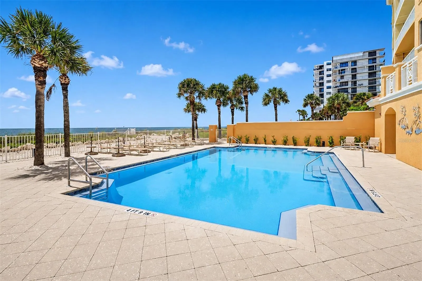 ... Gulf front Heated Pool Looking NW ....Numerous Lounging Areas..