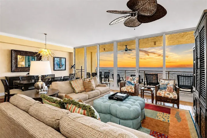 ... Sereno Residence 404  -  3 Bedroom  / 3.5 Bath With 2760 Sq Ft..  Floor To Ceiling High Impact Sliders Off Living Room - Right After Sunset.  27' X 10'  Gulf Front Balcony...
