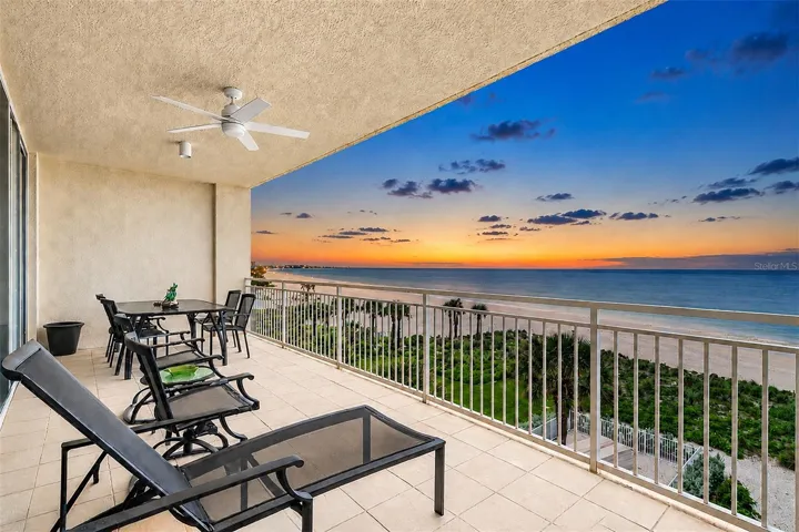 ... Sunsets and Twilights Shots of the Sereno. The Architectural Arc of the Complex Affords the Units  with Long Range Gulf Water Views. Residence 404 is Sitting  Right in the Center in the Cat's Seat.
