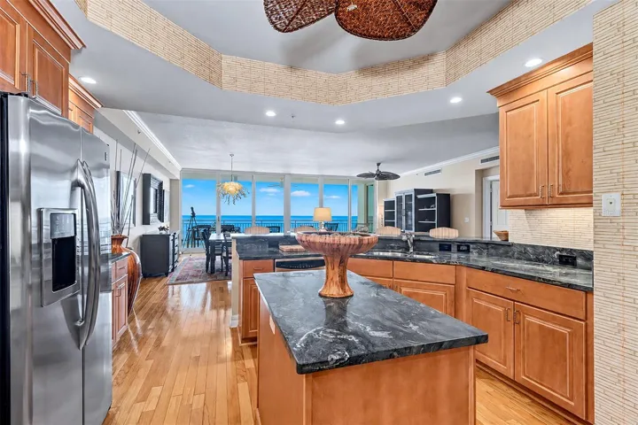 ...... Kitchen Pic 3.. Solid Wood Cabinetry - Granite - GE Profile Appliance Package . Prep Island.. Water View.