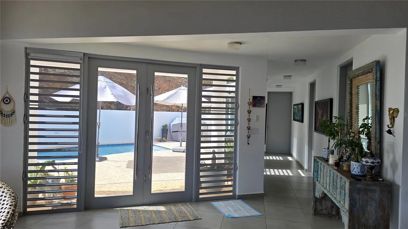 Great Room to Pool Deck and Hallway