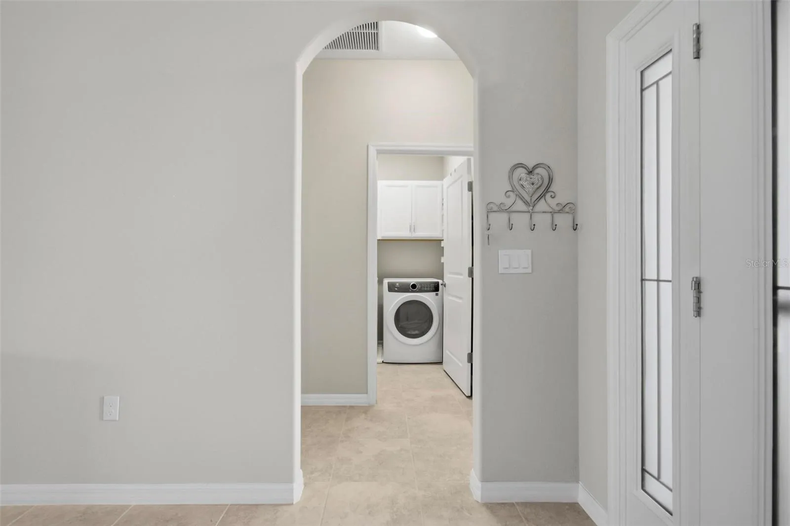 view of hallway to laundry room