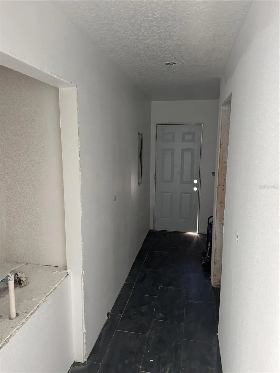 Laundry Room with Door to side yard