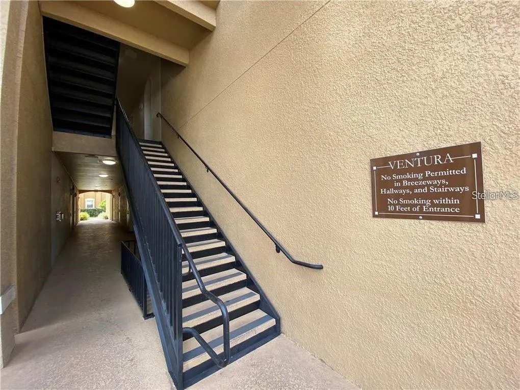 Second-floor unit conveniently located adjacent to the stairs.