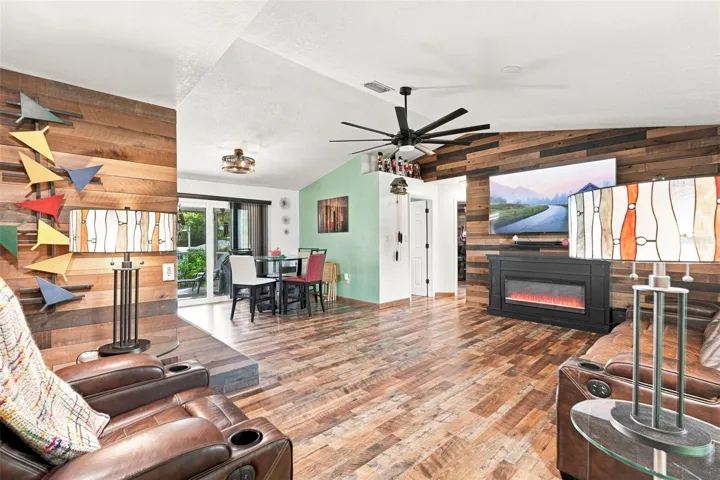 Renovated Living Room With Vaulted Ceilings