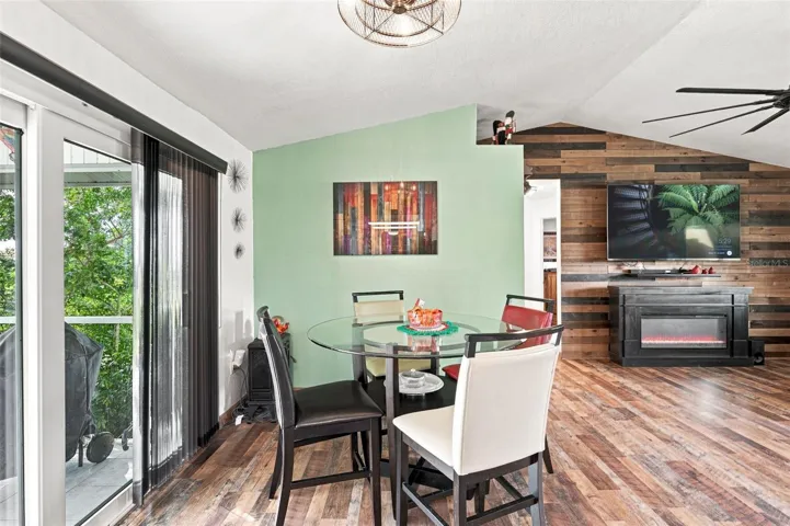 Dinette With Abundant Natural Light and Carefree Screen Patio Access