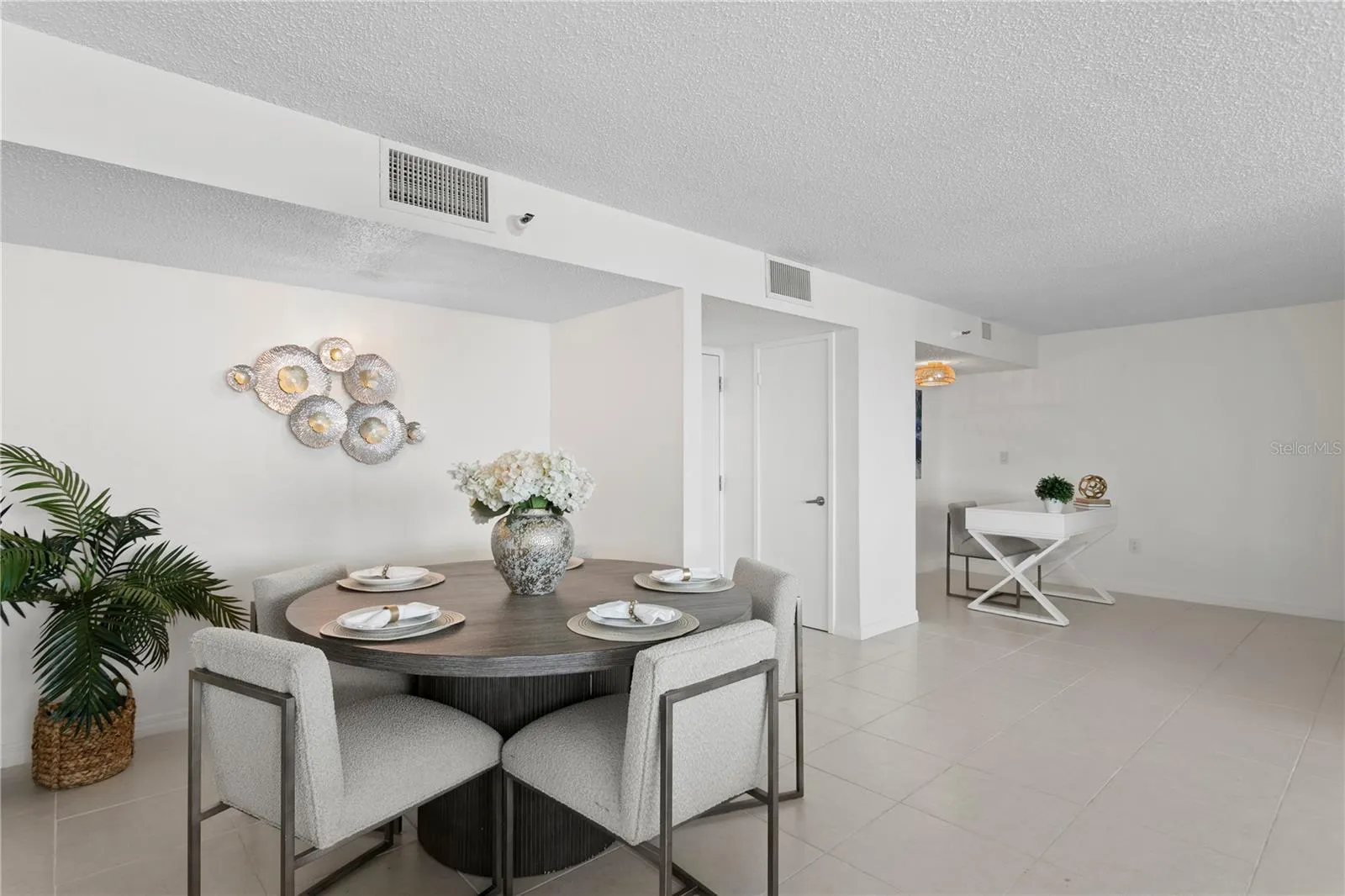 Spacious open-concept layout with a designated dining area and seamless flow throughout.