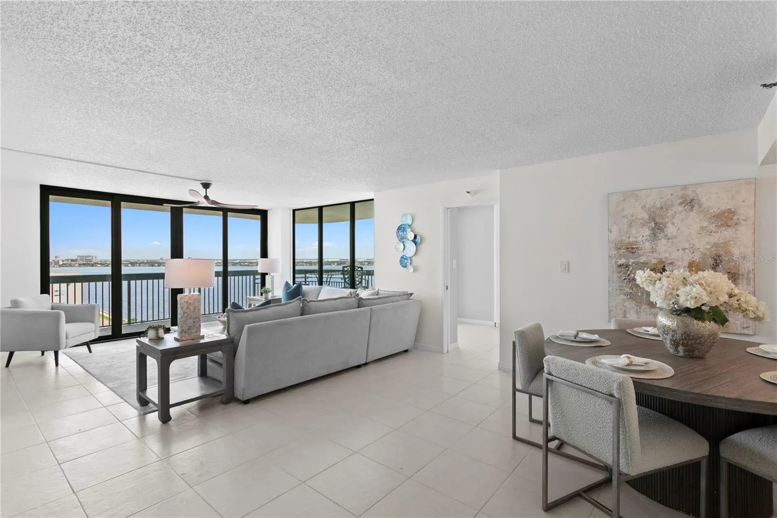 Welcome to this waterfront residence at The Atrium, where expansive balcony space and light-filled interiors create an exceptional setting for bayfront living.