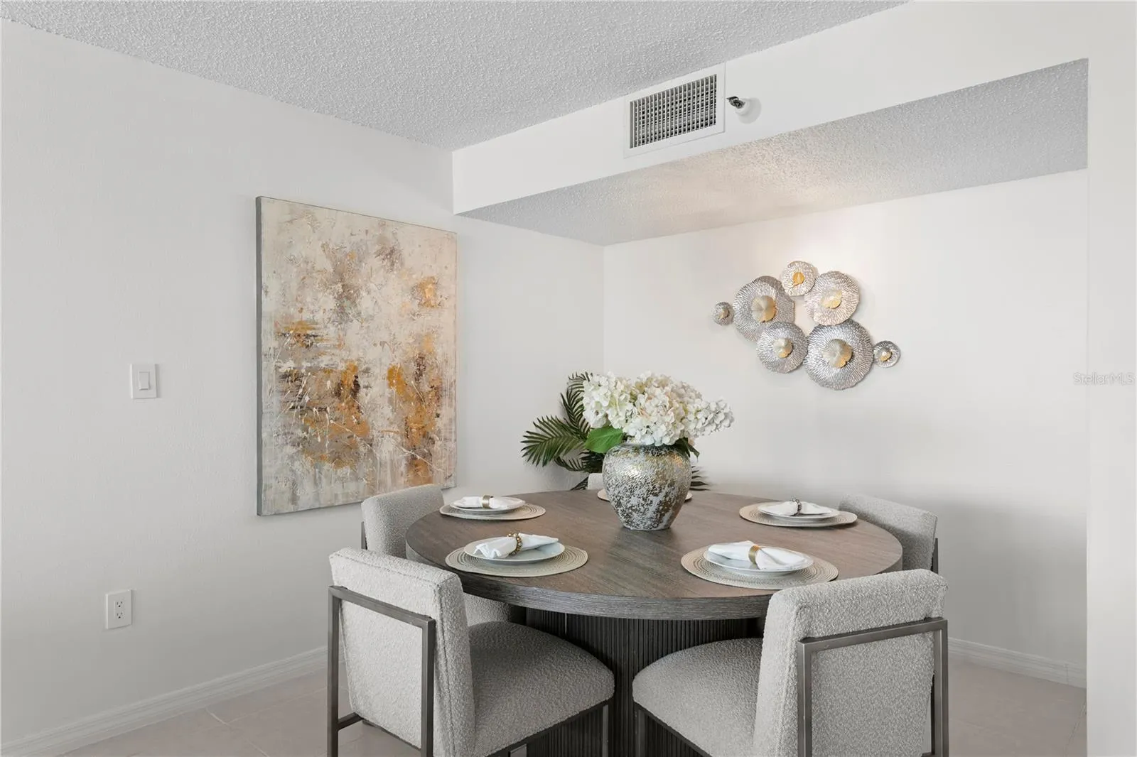 Spacious open-concept layout with a designated dining area and seamless flow throughout.