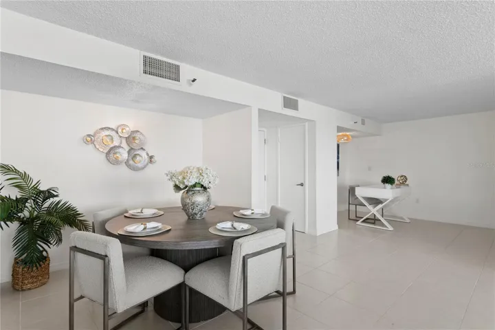 Spacious open-concept layout with a designated dining area and seamless flow throughout.