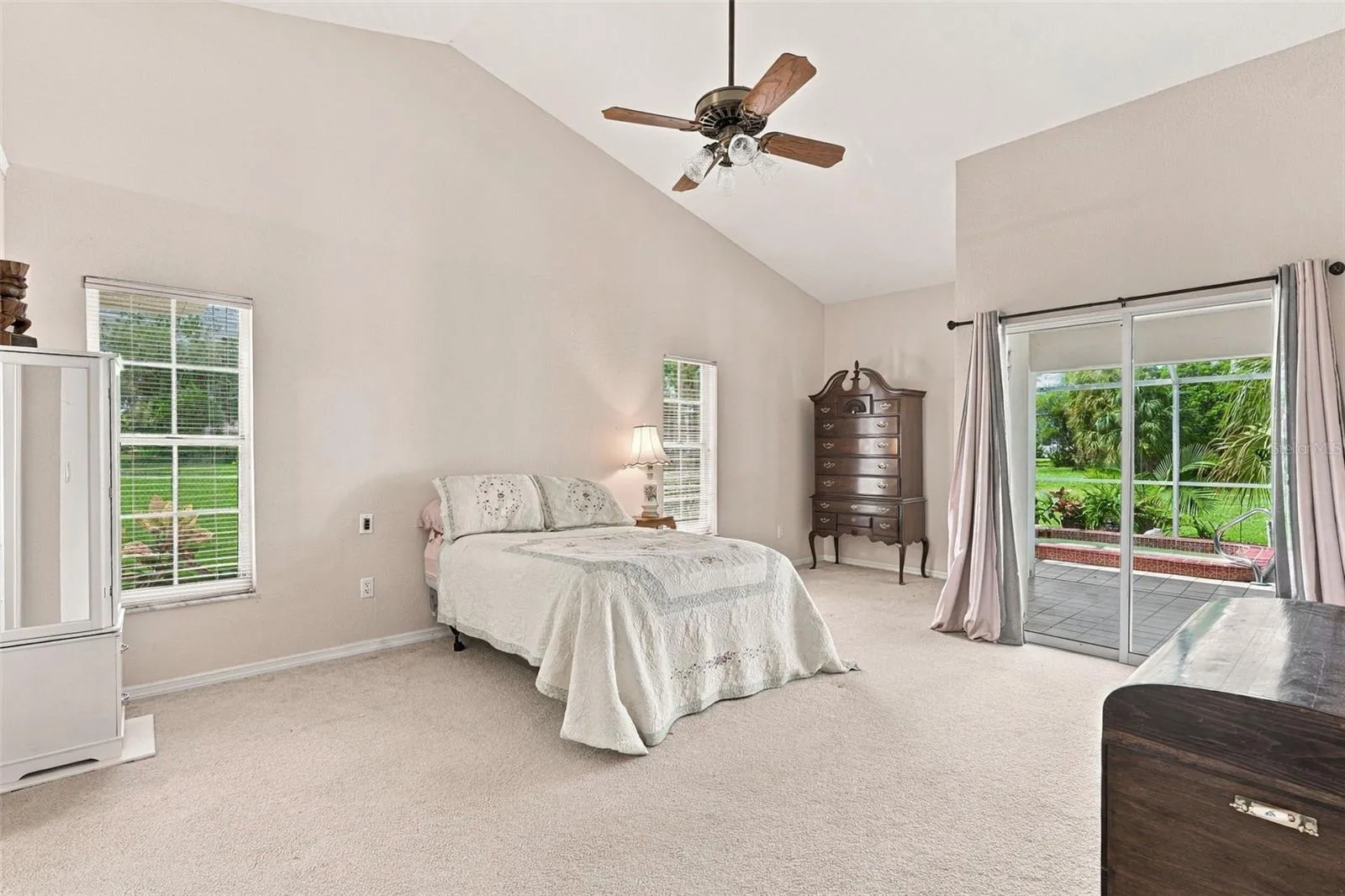 Master Bedroom Features Vaulted Ceiling, and Private Lanai Access