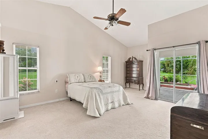 Master Bedroom Features Vaulted Ceiling, and Private Lanai Access