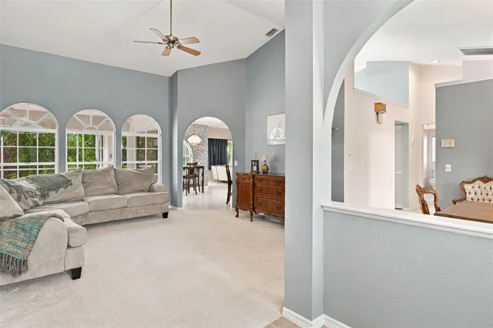 Open Living Area with Soaring Ceiling & Architectural Details