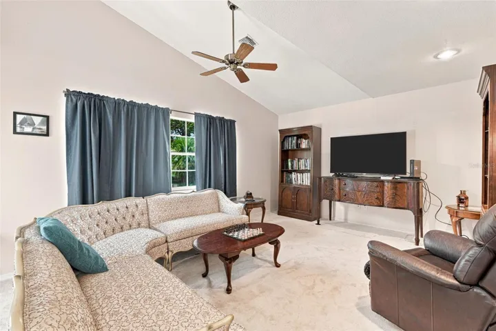 Comfortable Den with Vaulted Ceiling