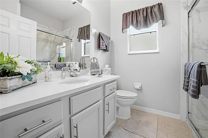 Guest Bathroom with walk in shower. New Shower, Sink and Counter