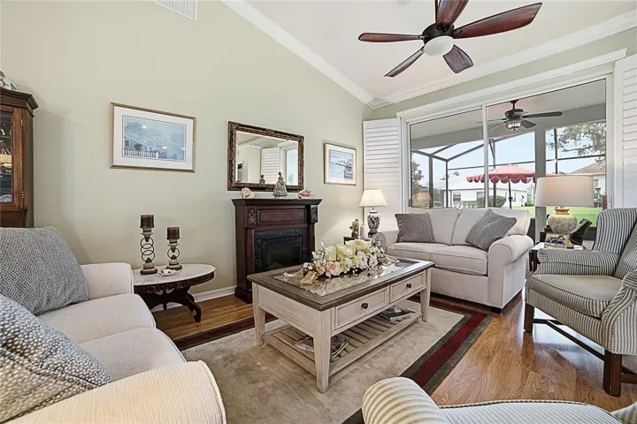 Formal Living Room. This home has Crown Moulding in all the main rooms and Plantation Shutters.