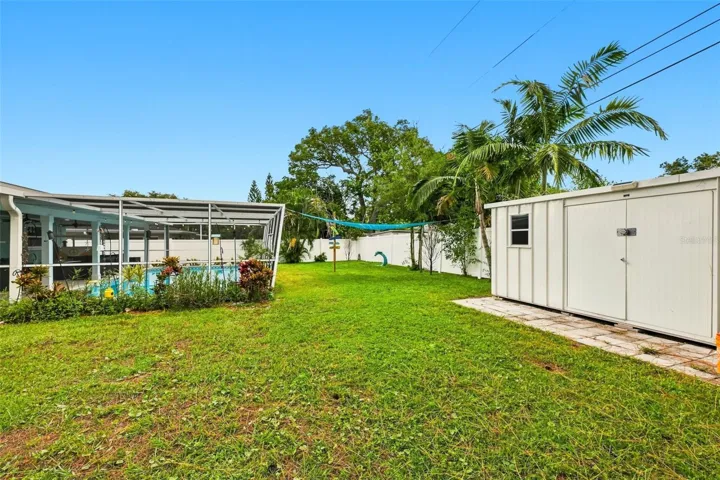 Fully Fenced in Backyard with extra Storage Space