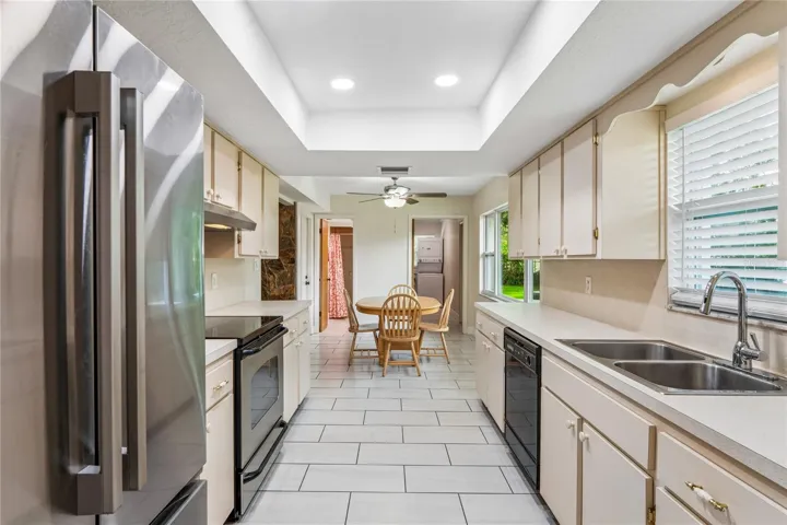 Breakfast Area/Laundry Room Entry/ Full Bathroom Entry/ Family Room Entry