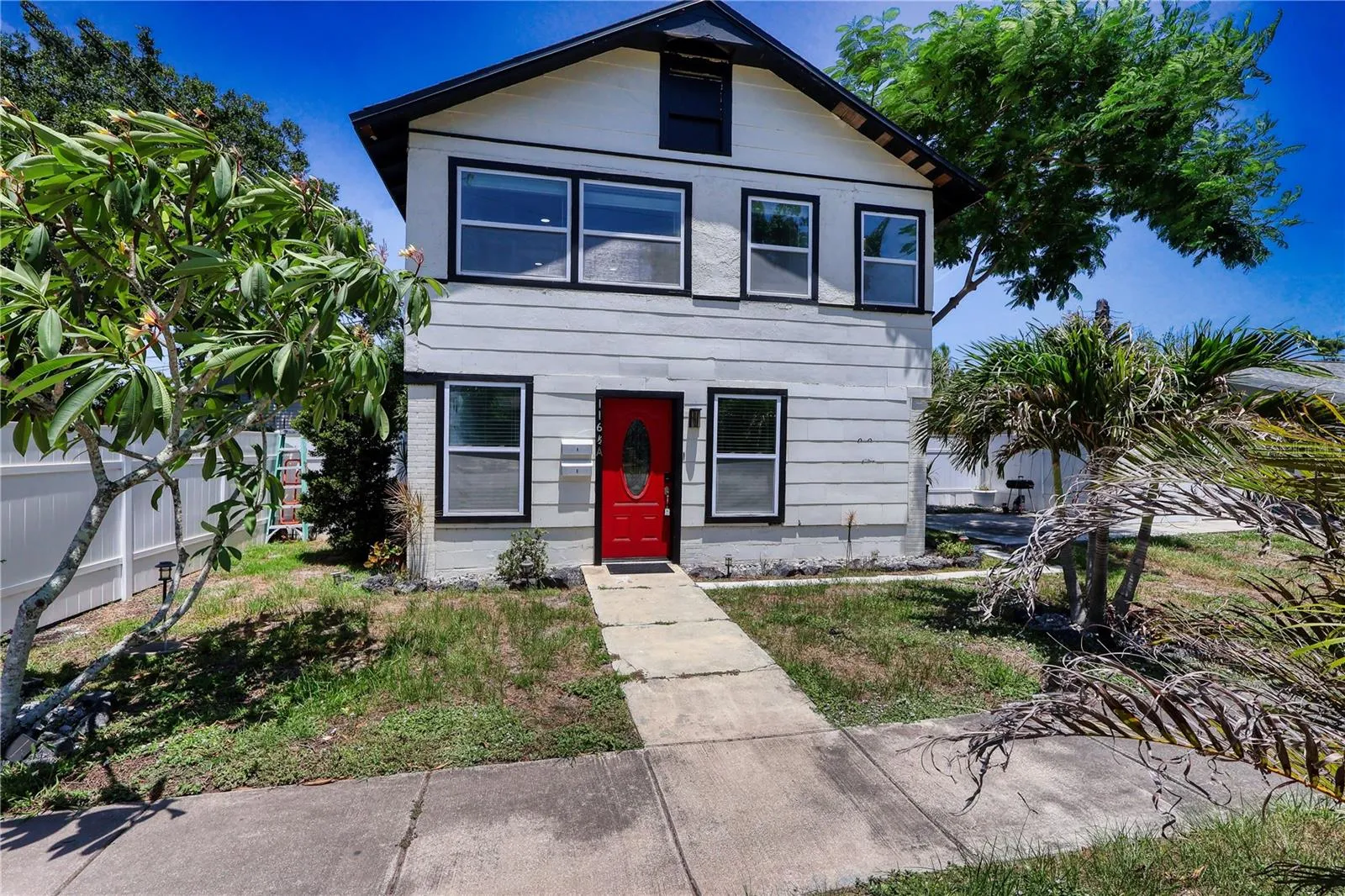 Two-story duplex featuring separate 1-bedroom residences, updated windows and additional rental-income.