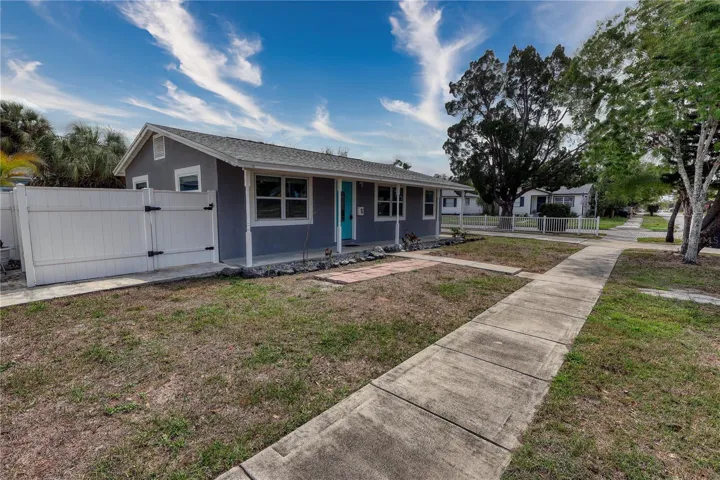Remodeled 2-bedroom main residence featuring a vinyl-fenced yard, separate utility meter and established rental income.