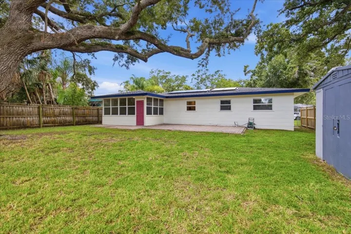 Spacious Backyard With Shed