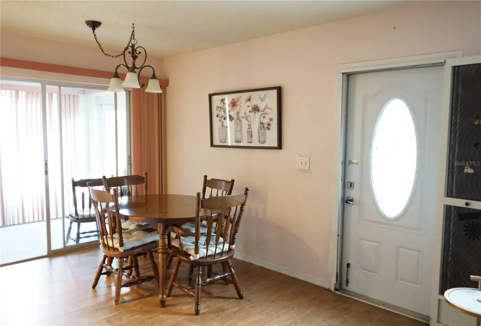 dining area with slider out to lanai