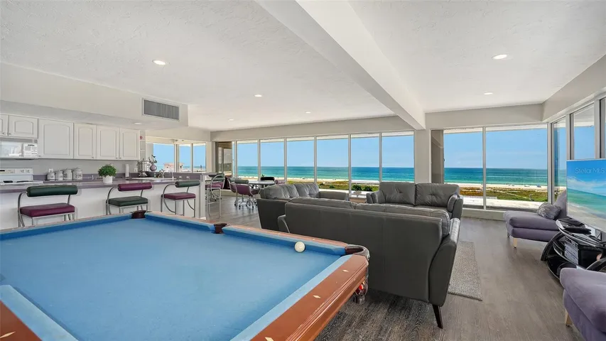 Club Room with plenty of seating, Pool table and kitchen