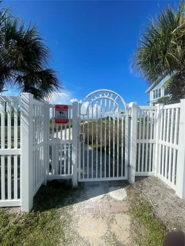 Private coded gate to Siesta Beach.
