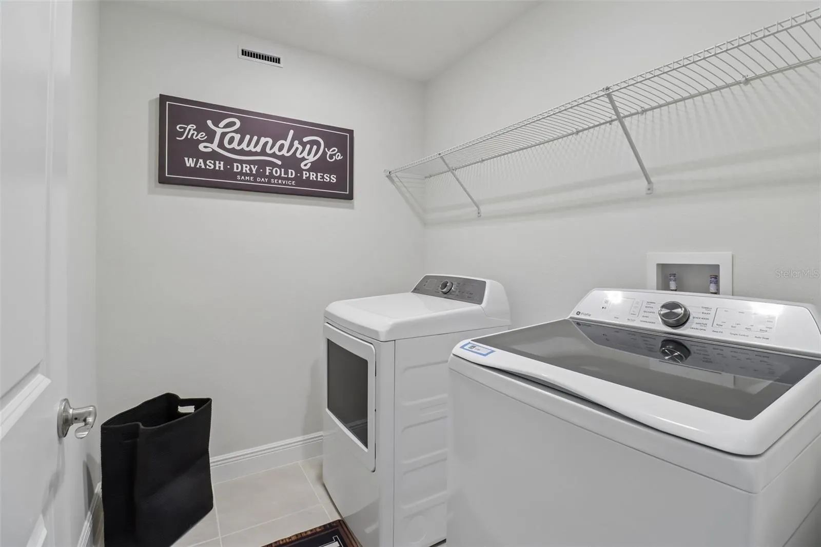 Convenient second floor laundry room.