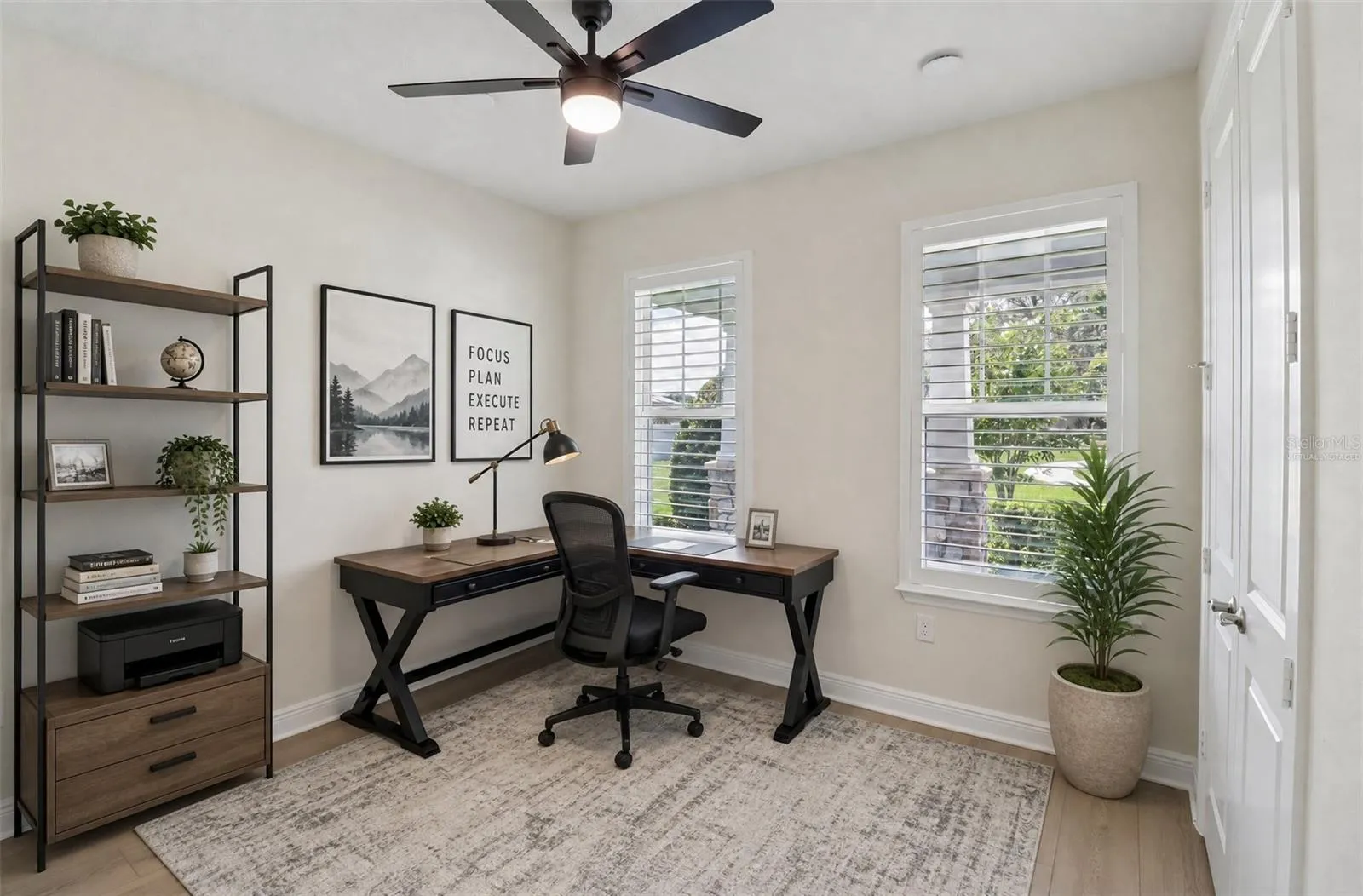 Versatile main floor bedroom. Virtually Staged.