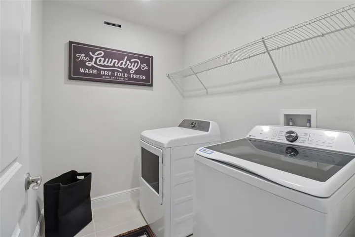 Convenient second floor laundry room.