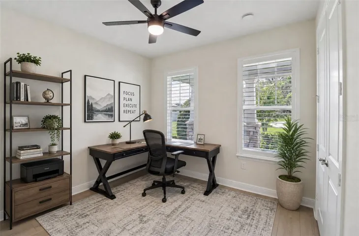 Versatile main floor bedroom. Virtually Staged.