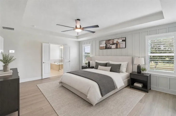 Light, bright and elevated - welcome to your primary suite! Virtually Staged.