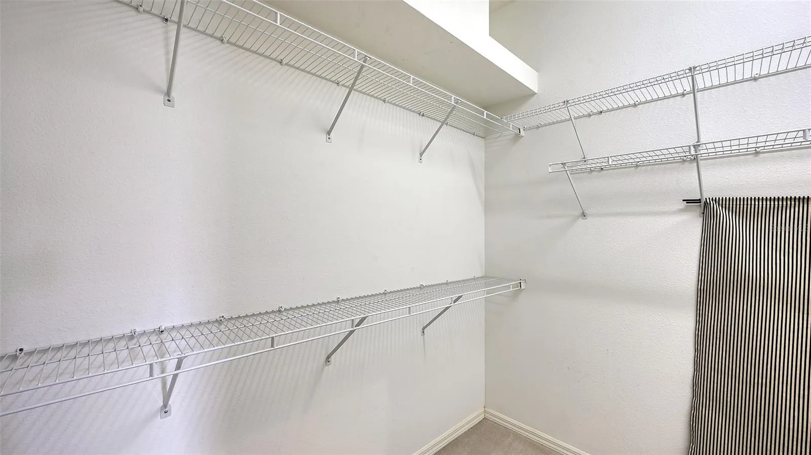Large walk in closet in primary suite