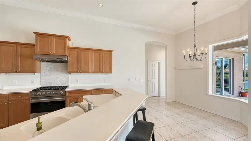 Informal eating in Kitchen with  pool view