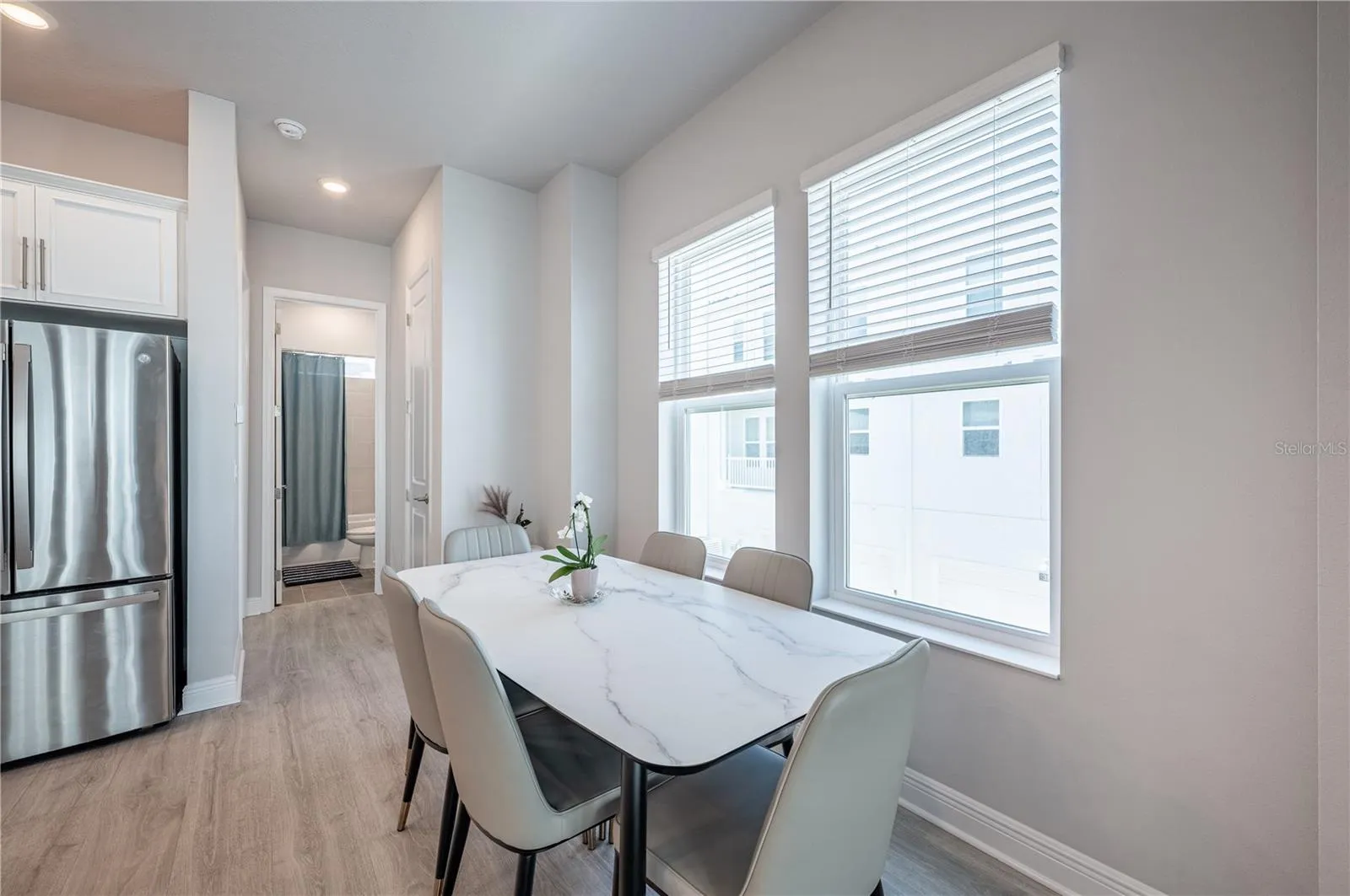 Beyond the kitchen an dining area, is a bedroom and bathroom...