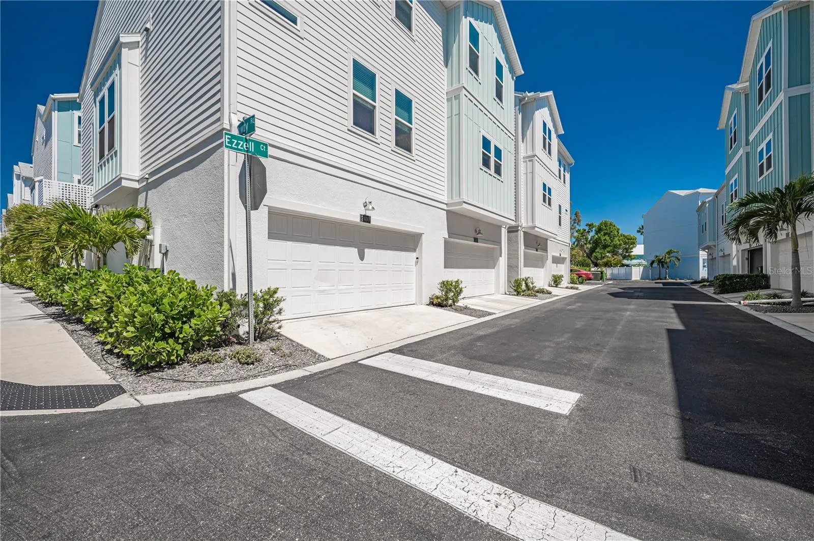 Garage door can be controlled by a remote control or an app--that can be operated from anywhere in the world.