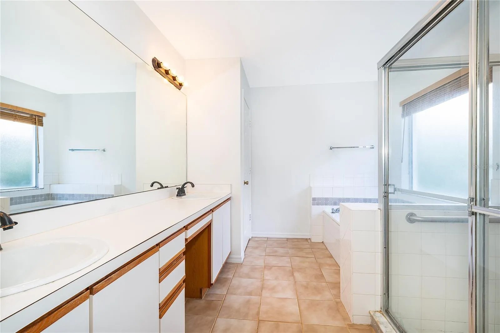 Dual Sinks + Make-Up Area in Primary Bath