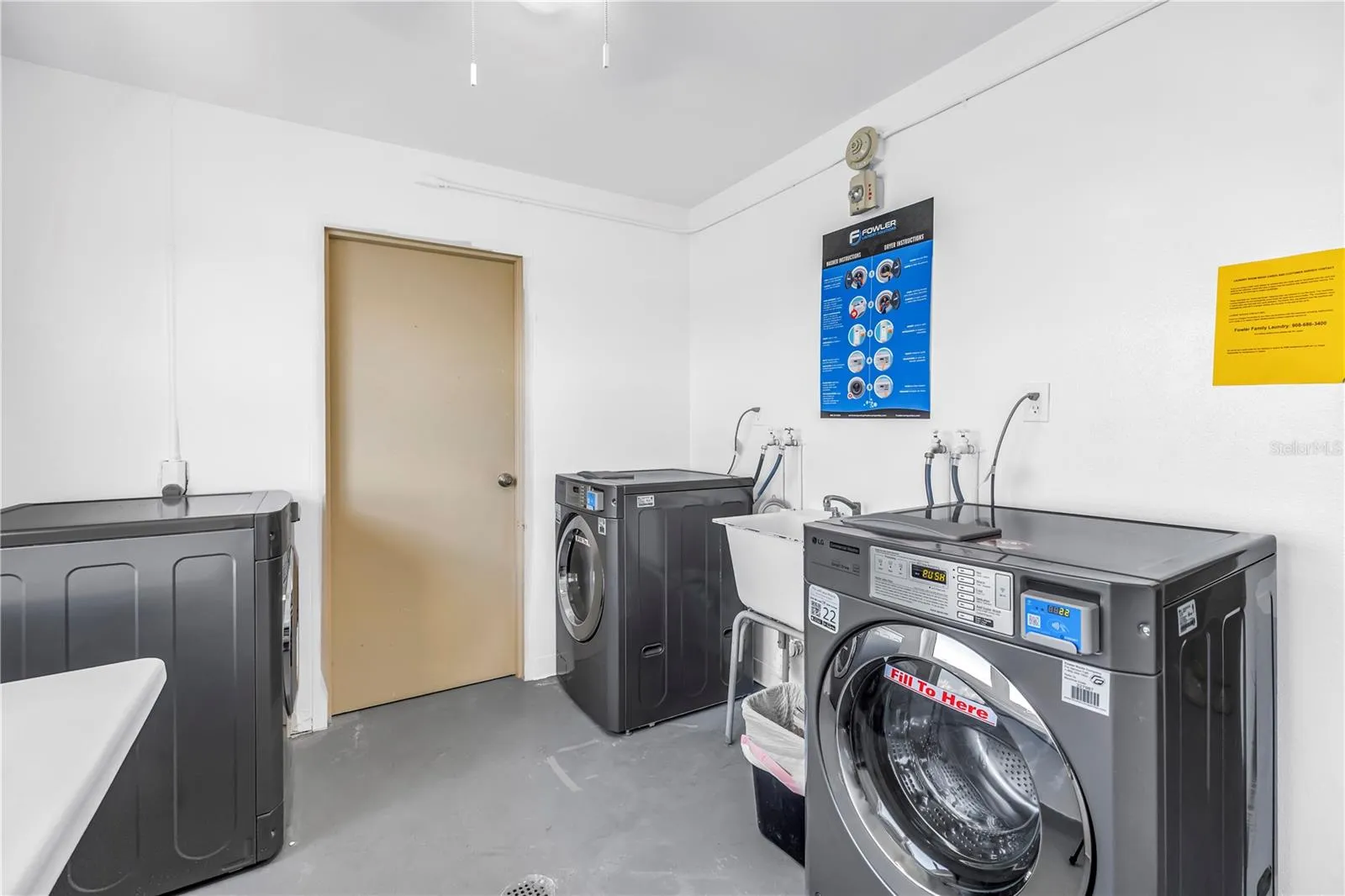 Updated modern laundry with storage beyond