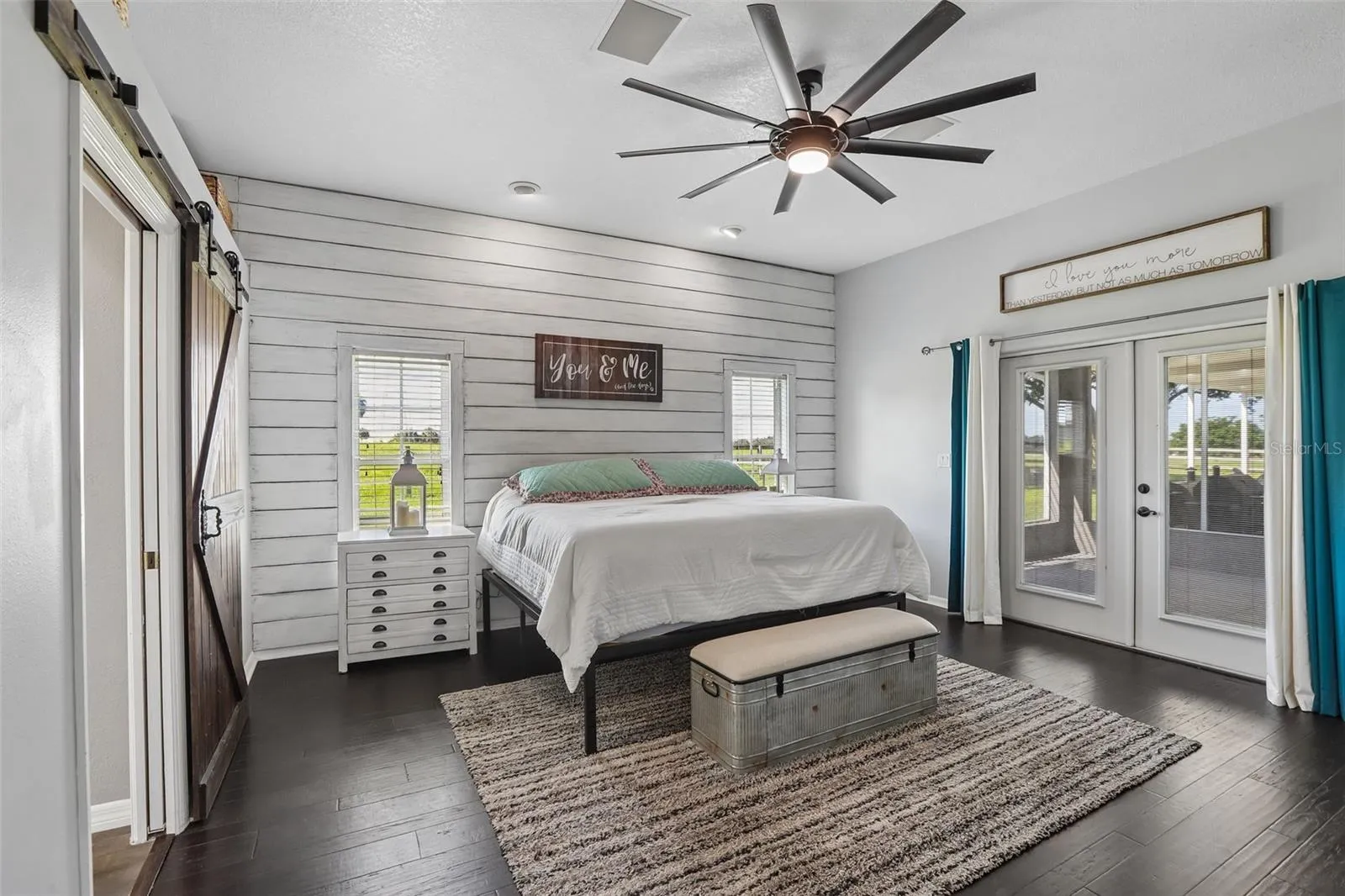 Primary Bedroom With Barn door to Primary Bathroom
